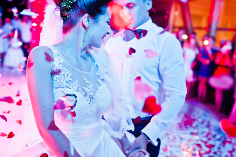 Wedding dance in restaurant with various lights and smoke